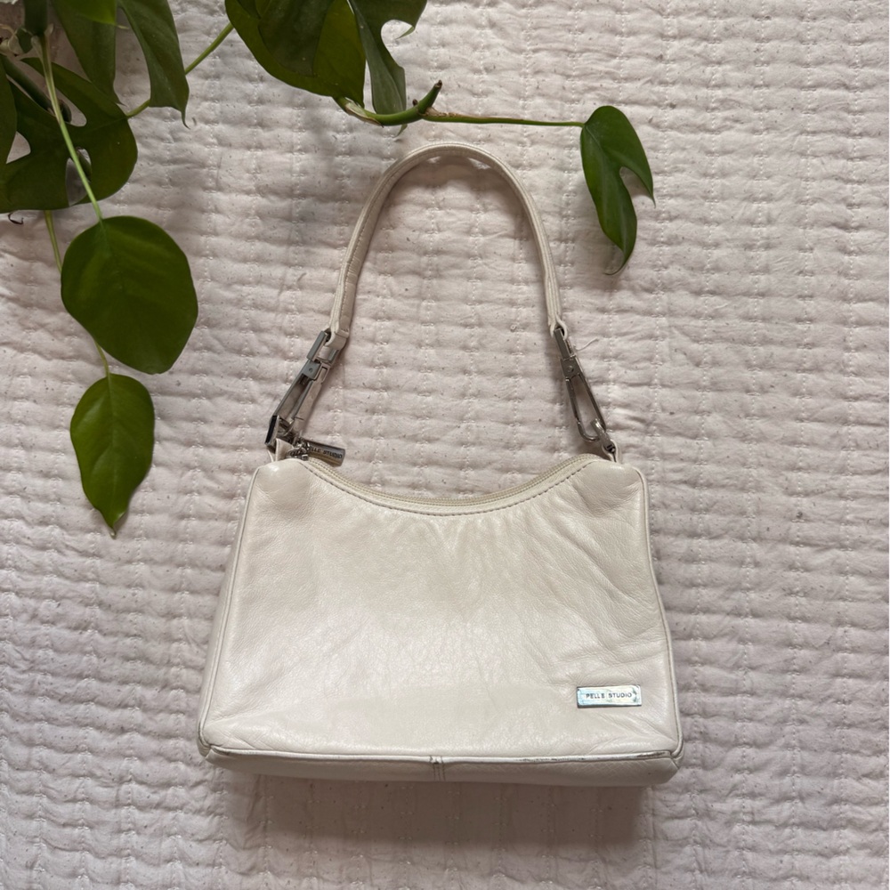 Cream leather shoulder bag with silver hardware